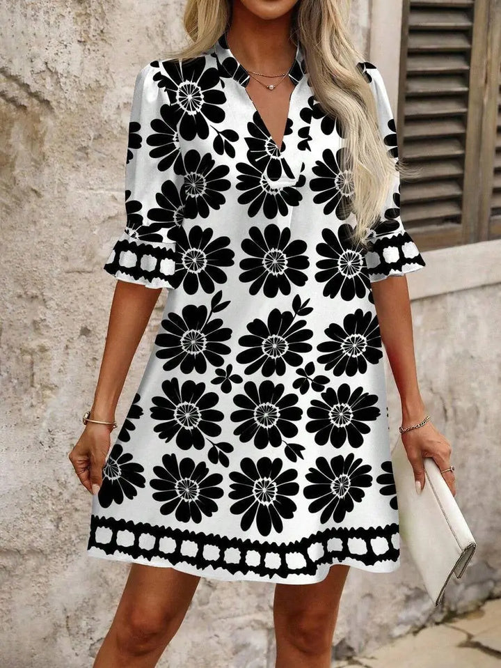 Black Women's Floral A-Line Dress with V-Neck & Ruffle Sleeves — Odette