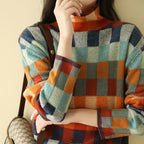 Orange Women's Cashmere Check Sweater with Mock Neck & Relaxed Fit - Chest Close Up
