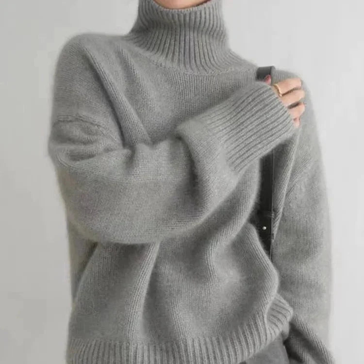 Women's Cashmere Turtleneck Sweater with Ribbed Cuffs & Relaxed Fit - Side Pose
