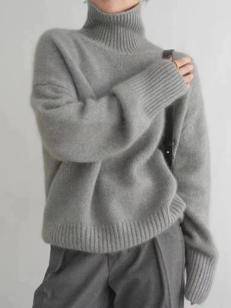 Grey Women's Cashmere Turtleneck Sweater with Ribbed Cuffs & Relaxed Fit - Front Shoulder Detail