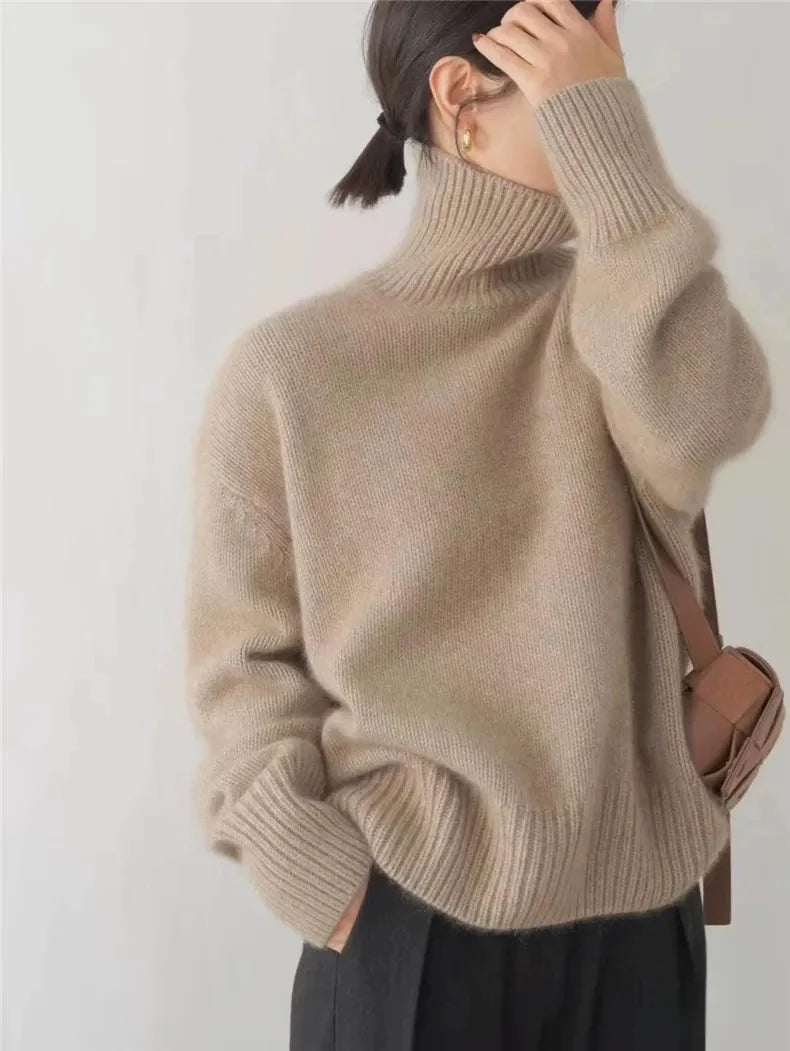 Khaki Women's Cashmere Turtleneck Sweater with Ribbed Cuffs & Relaxed Fit - Back Side Pose