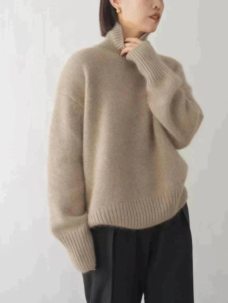 Women's Cashmere Turtleneck Sweater with Ribbed Cuffs & Relaxed Fit - Side Profile Pose
