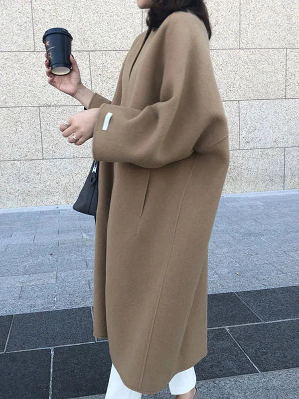 Women's Long Wool Coat with Collarless Neckline & Oversized Sleeves - Side Profile