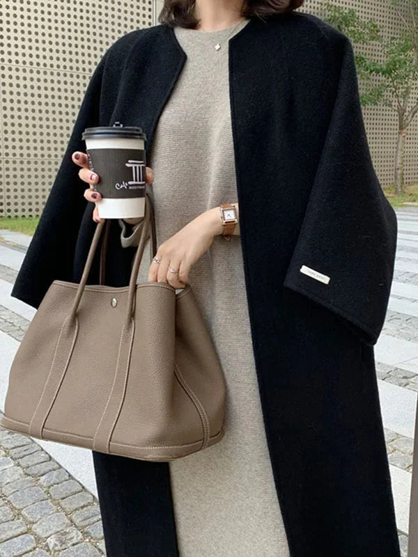 Women's Long Wool Coat with Collarless Neckline & Oversized Sleeves - Close Up Bag Detail