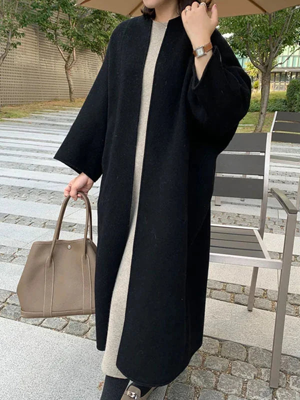 Black Women's Long Wool Coat with Collarless Neckline & Oversized Sleeves