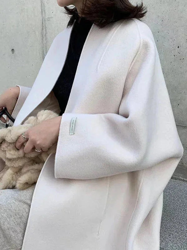 White Women's Long Wool Coat with Collarless Neckline & Oversized Sleeves