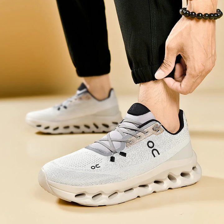 Gray Unisex Running Shoes with Knit Mesh Upper & Hollow Chamber Midsole - Worn Lifestyle Side