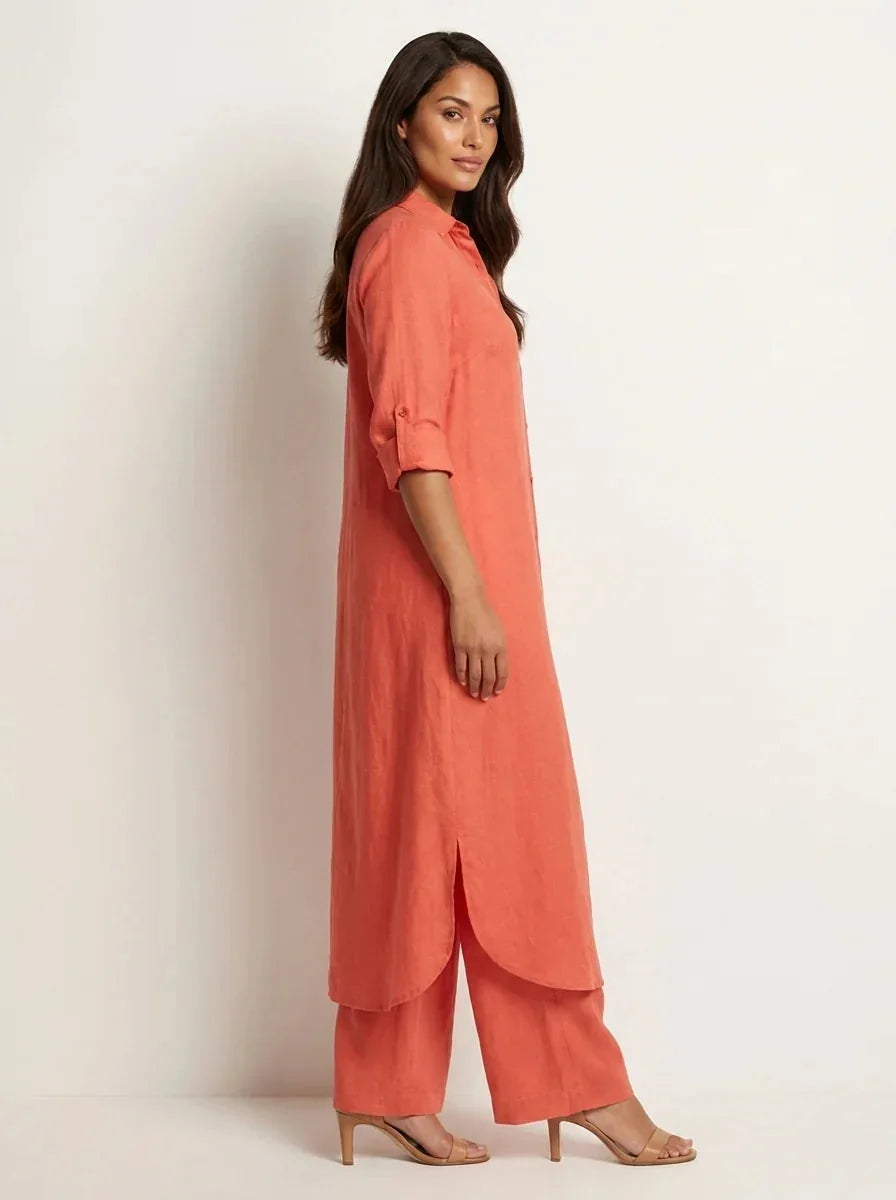 Red Women's Linen Shirt Dress with Rolled Sleeves & Curved Maxi Hem — Edith - Side Profile Walking