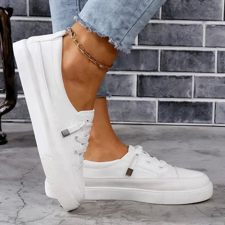 White Women's Leather Sneakers with Cushioned Low-Top Lace-Up Design — Sophie - Side Profile Worn