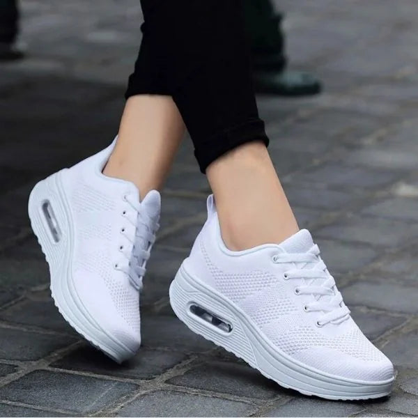 White Women's Mesh Sneakers with Lace-Up Closure & Air Cushion Sole - Model Walking