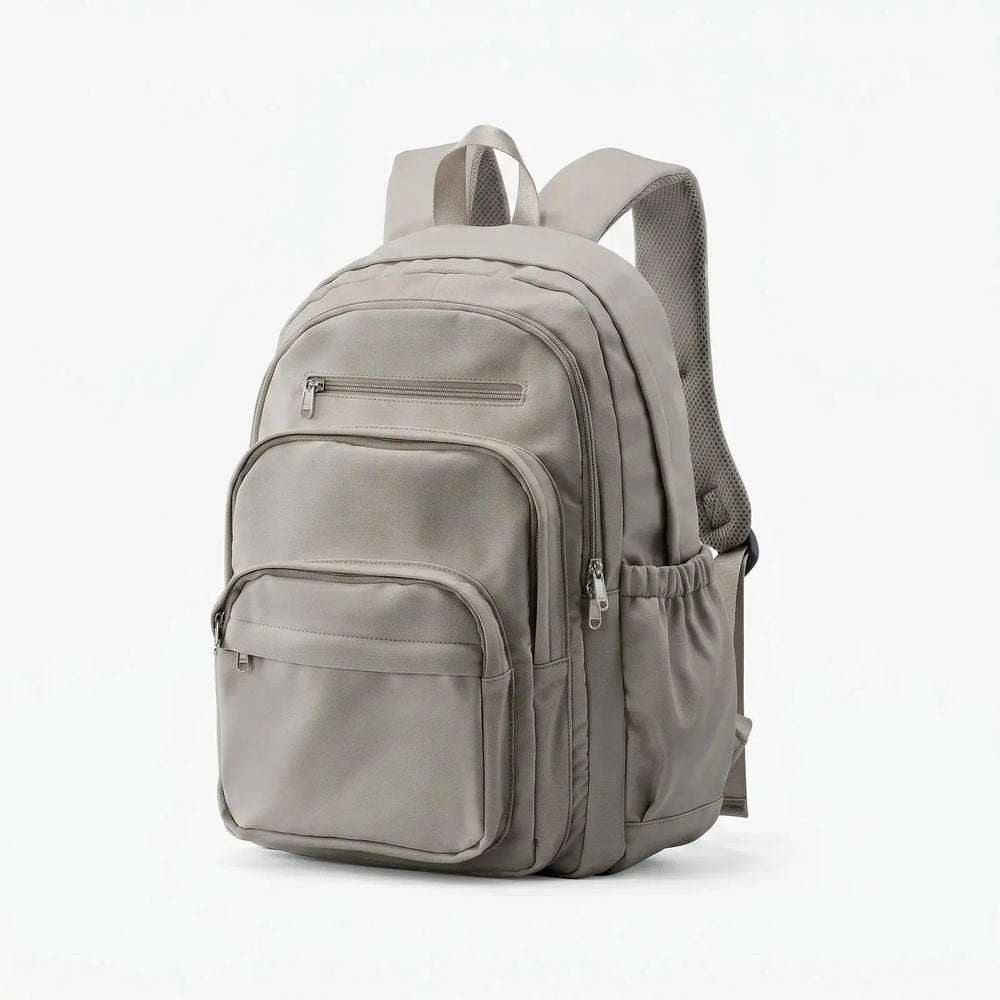 Grey Everyday Multi Pocket Backpack with Adjustable Straps & Side Pockets — Eilidh - Brown Studio Side View