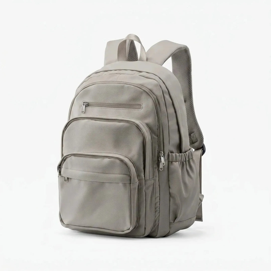 Grey Everyday Multi Pocket Backpack with Adjustable Straps & Side Pockets — Eilidh - Brown Studio Side View
