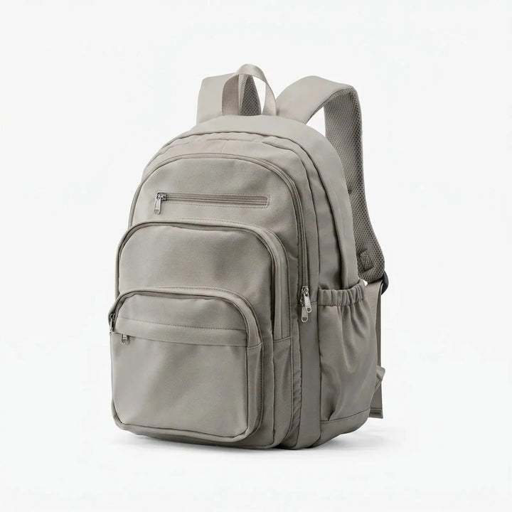 Grey Everyday Multi Pocket Backpack with Adjustable Straps & Side Pockets — Eilidh - Brown Studio Side View