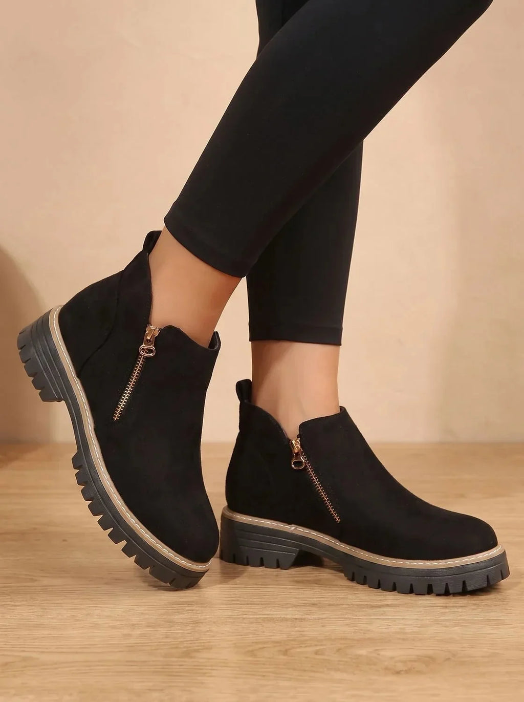 Black Women's Orthopedic Ankle Boots with Cushioned Insole & Side Zipper - Side Step Pose