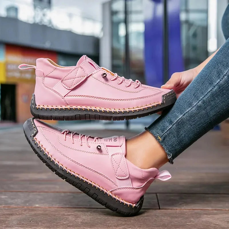Pink Women's Orthopedic Leather Sneakers with Lace-Up & Velcro Strap - Hand Hold Pose