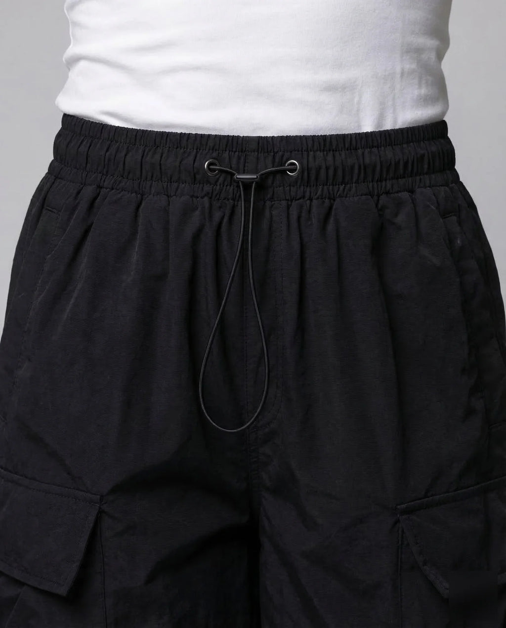 Black Women's Oversized Cargo Pants with Drawstring Waist & Flap Pockets — Lena - Close Up Waistband