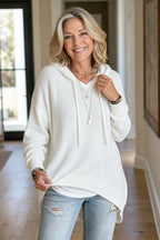 White Women's Oversized Hooded Knit Sweater with Drawstring & Relaxed Fit — Marigold - Front Pose
