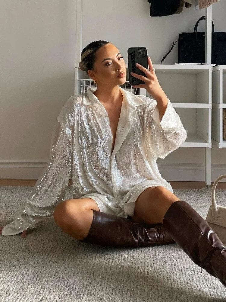 Women's Oversized Blouse with Shimmer Finish & Button-Front Design - Seated Boots Pose