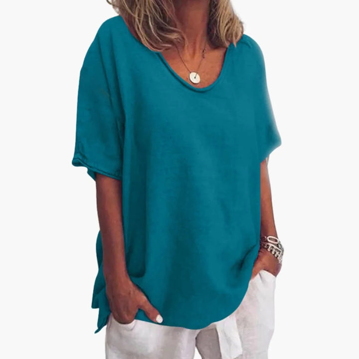 Ocean Blue Women's Short Sleeve Blouse with V-Neck & Rolled Cuffs - Front Hand In Pocket