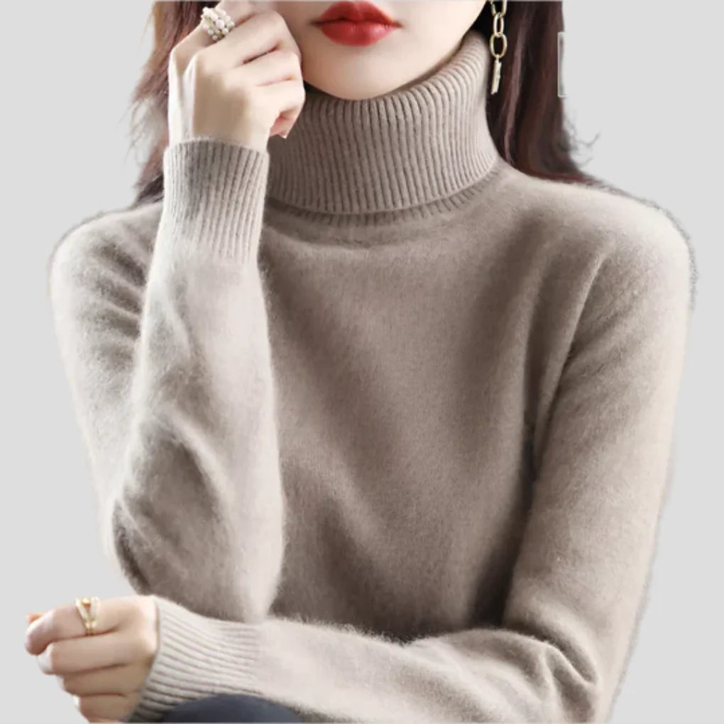 Camel Women's Ribbed Turtleneck Sweater with Fitted Silhouette for Cozy Layering - Arm Crossed