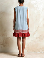 Light Blue Women's Cotton Tunic Dress with Ruffle Hem & Striped Trim — Persephone - Front Pose