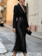 Black Women's Sequin Midi Dress with Structured Blazer Bodice & Fringe Hem - Side Profile Walking