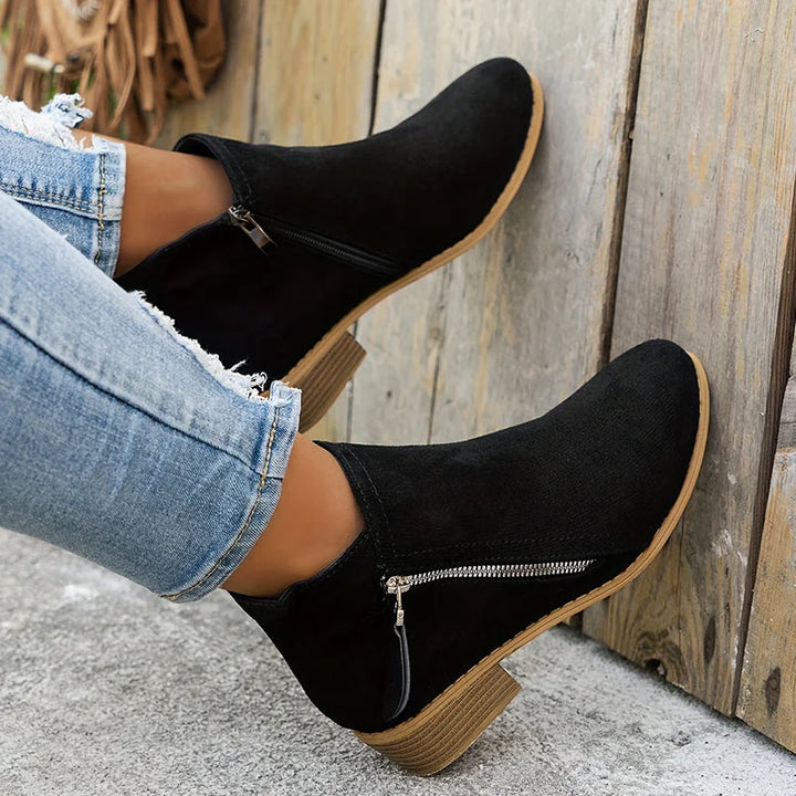 Black Women's Suede Side Zip Boots with Pointed Toe & Stacked Heel — Catherine - Propped Against Wall