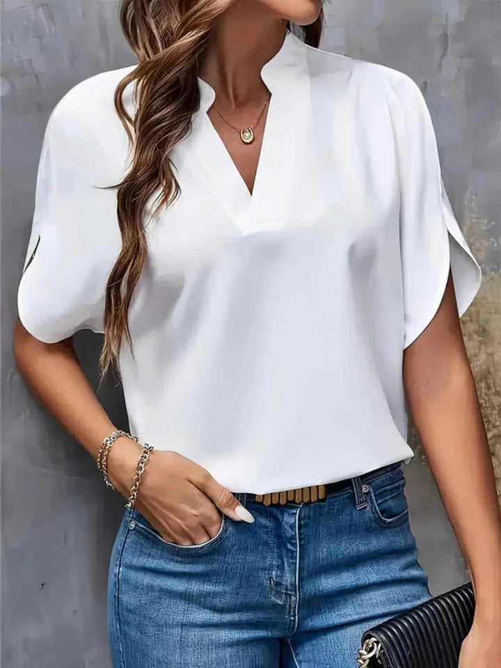 White Women's Everyday Split-Neck Blouse with Flutter Sleeves — Brittany - Side Pose