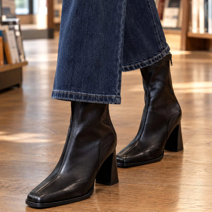 Black Single Lining Women's Leather Ankle Boots with Square Toe & High Block Heel - Side Pose Walking
