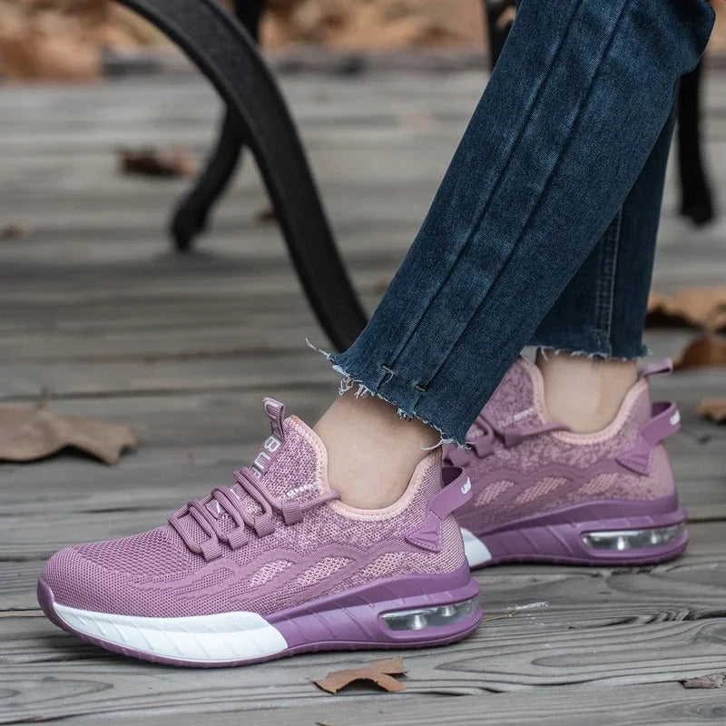 Purple Women's Steel Toe Sneakers with Air Cushion & Lace-Up Closure - Outdoor Pose