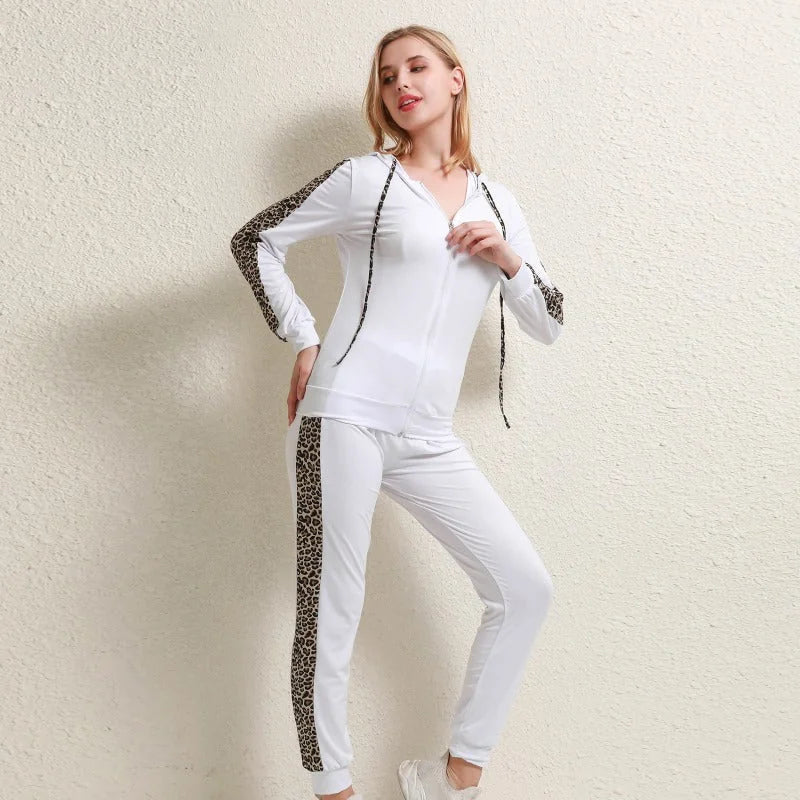 White Women's Leopard-Trim Tracksuit with Hooded Zip Jacket & Jogger Pants — Valerie - Side Standing Pose