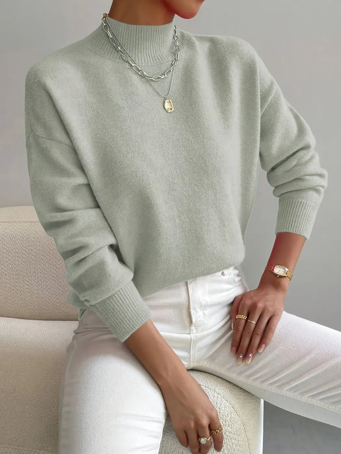 Light Green Women's Turtleneck Sweater with Ribbed Collar & Oversized Relaxed Fit — Tahlia - Front Seated Pose