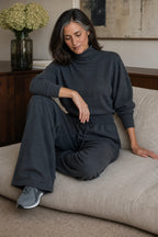 Women's Turtleneck Pants Set with Relaxed Wide-Leg Fit - Sitting Couch