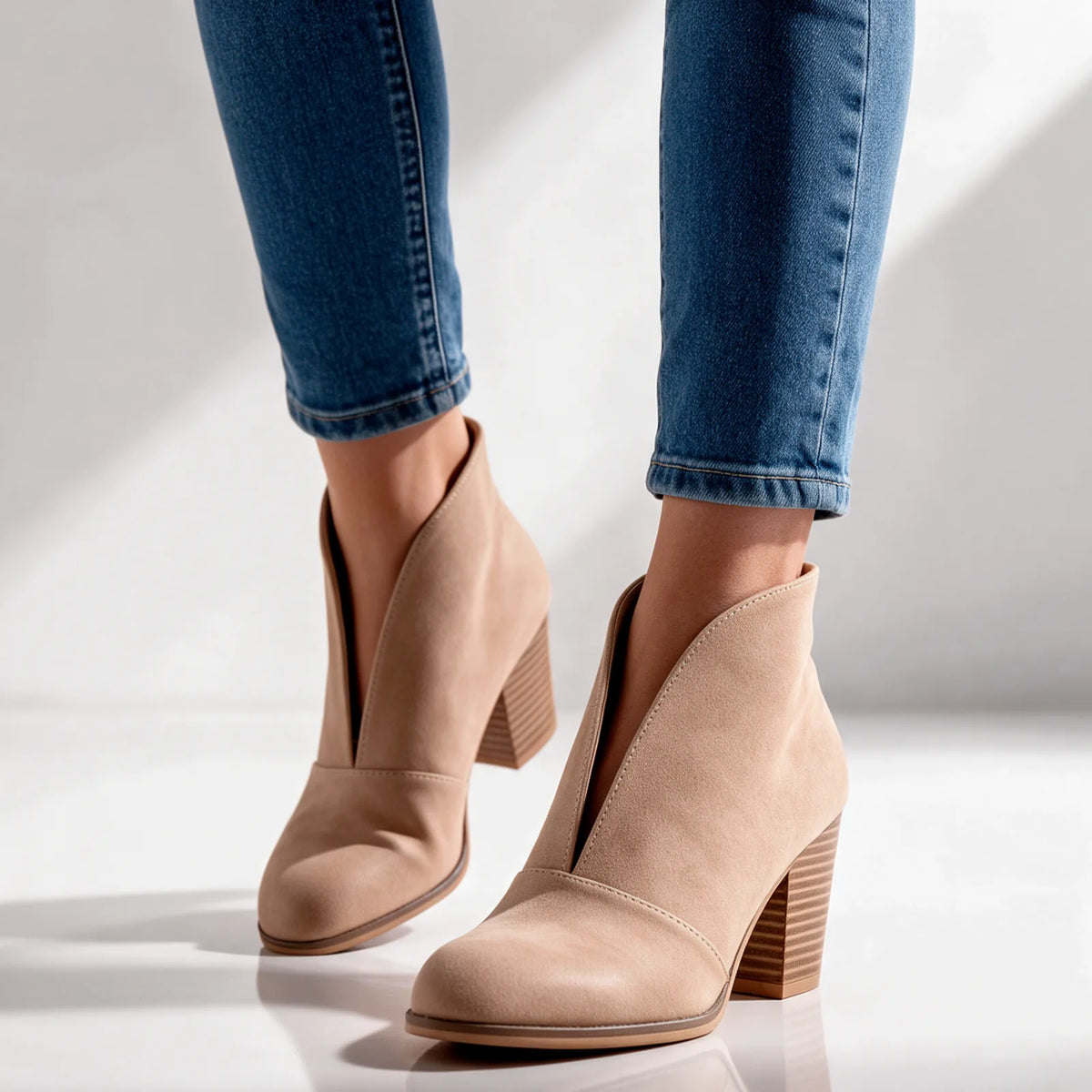 Women's V Cut Ankle Boots with Almond Toe & Stacked Block Heel - Model Walking Jeans