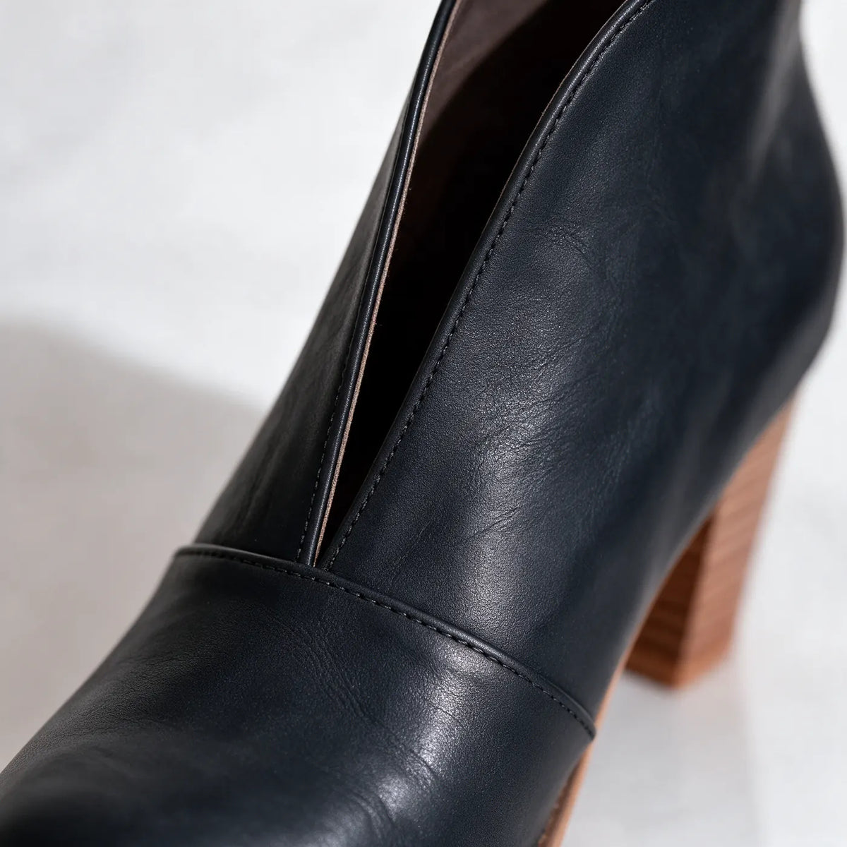 Women's V Cut Ankle Boots with Almond Toe & Stacked Block Heel - Close Up Heel Detail