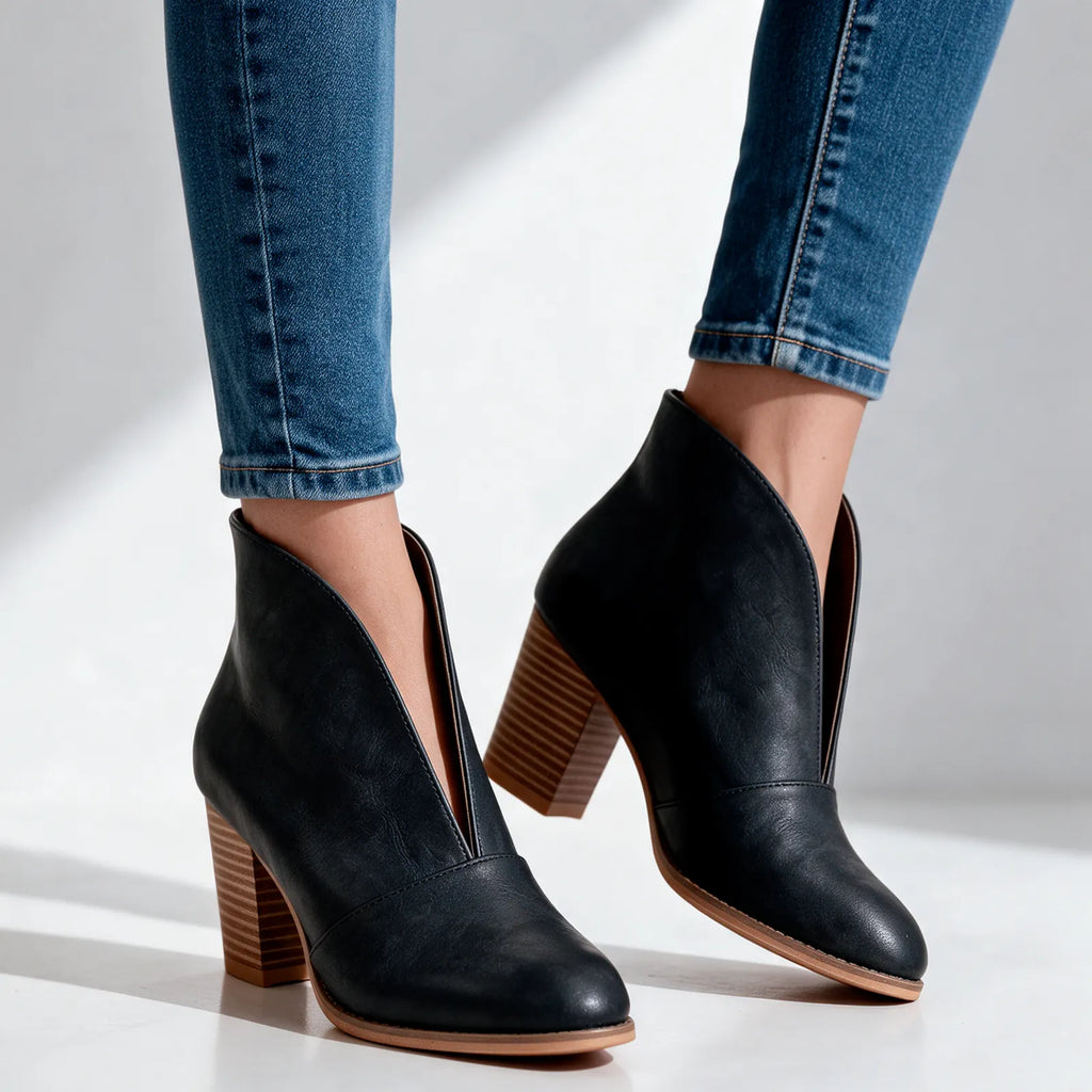 Women's V Cut Ankle Boots with Almond Toe & Stacked Block Heel - Model Walking Side