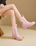 Pink Women's Waterproof Chelsea Boots with Knit Ankle Cuff & Pull Tabs — Siobhan - Seated Dangling Feet