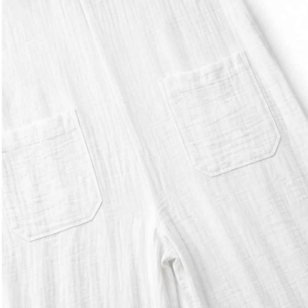 White Women's Wide Leg Jumpsuit in Crinkle Linen with Button-Front Collar — Halle - Close Up Pockets